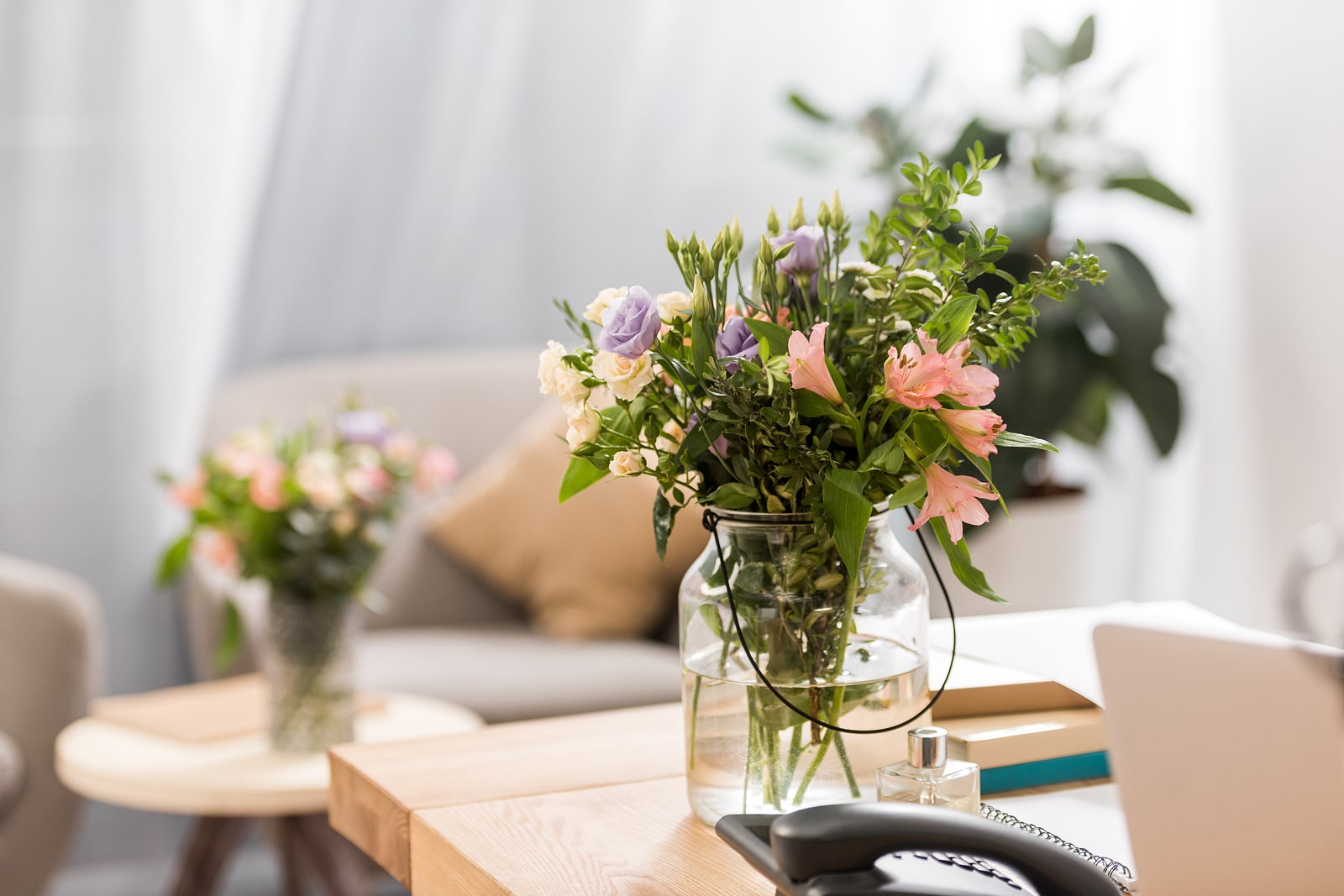 Elegant flower arrangement in a cozy living room setting